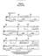 Places sheet music for voice, piano or guitar